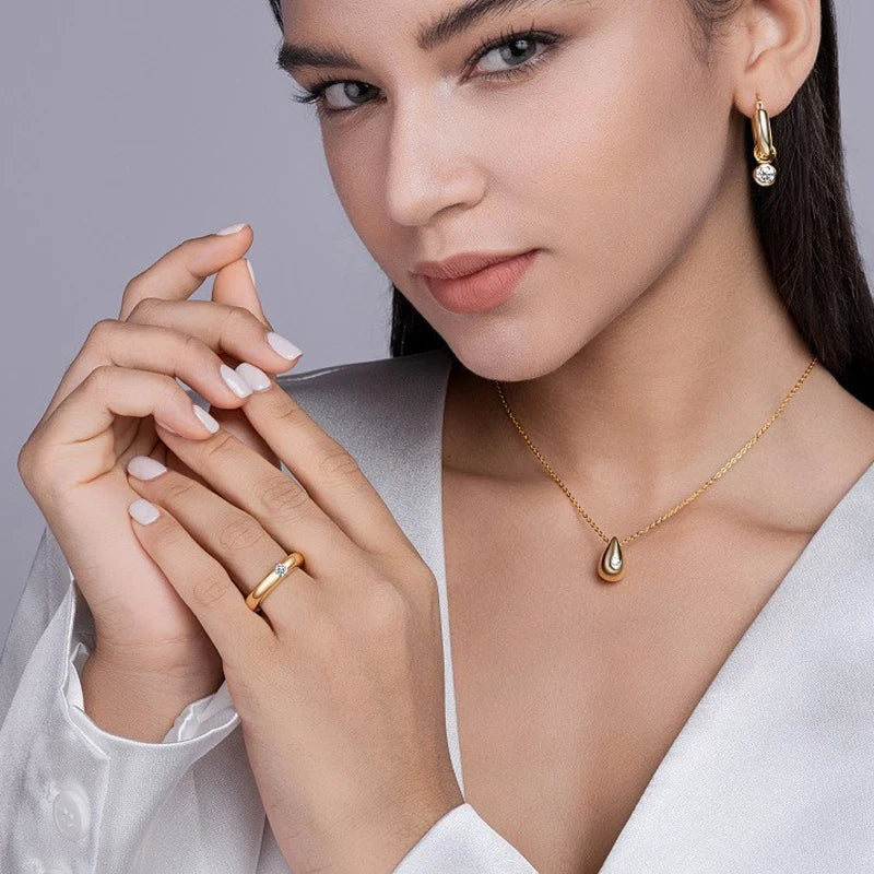 Aromi Gold Dome Moissanite Ring